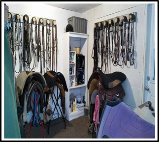 A photo of a neatly organized tack room