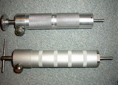 Photograph of a penetrative captive bolt gun.
