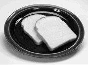 Image de deux tranches de pain dans une assiette.