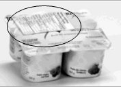 The nutrition facts table is placed on the top of the yogurt six pack.