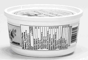 Margarine container where the nutrition facts table is tipped on its side, therefore it is not orientated in the same manner as the other labelling information on the container as there was insufficient space to do so. This is acceptable.
