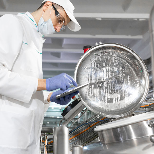 CFIA staff at a food processing plant.